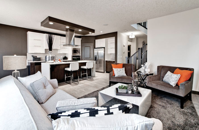 Mid-sized trendy open concept carpeted living room photo in Calgary with white walls