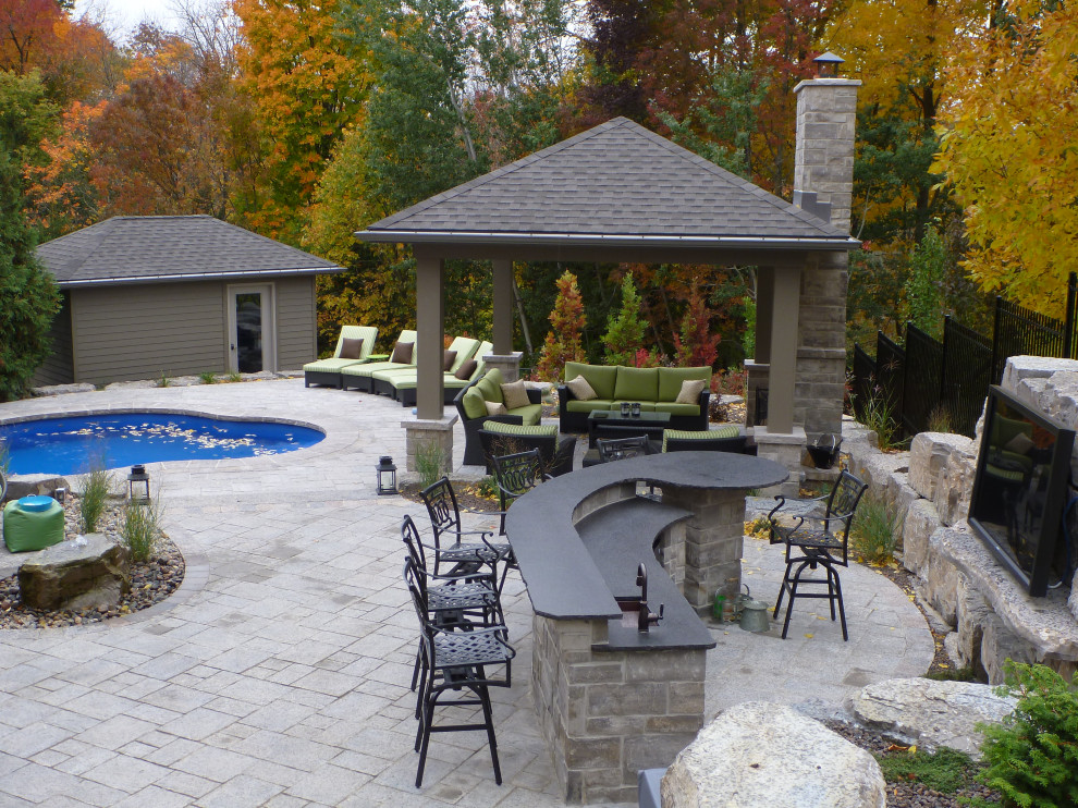 Inspiration for a transitional pool remodel in Toronto