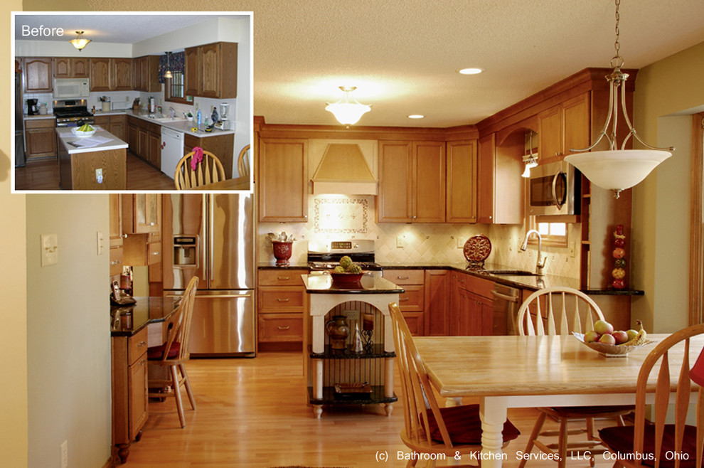 Mid-sized transitional u-shaped medium tone wood floor eat-in kitchen photo in Columbus with an undermount sink, granite countertops, beige backsplash, stone tile backsplash, stainless steel appliances, an island, flat-panel cabinets and medium tone wood cabinets