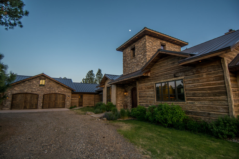 Expansive country exterior in Denver with mixed siding.