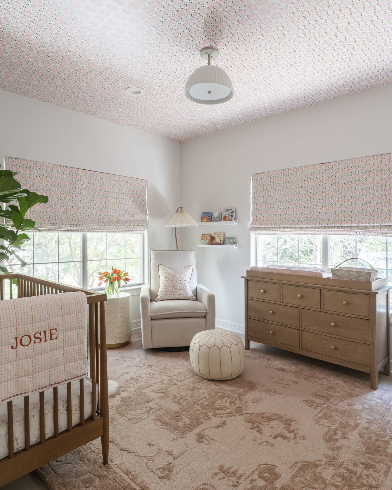 Design ideas for a medium sized classic nursery for girls in Austin with white walls, light hardwood flooring, brown floors and a wallpapered ceiling.