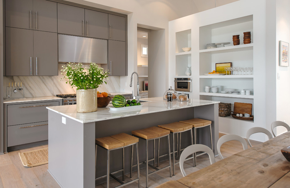 Example of a trendy open concept kitchen design in Dallas with an undermount sink, flat-panel cabinets, gray cabinets and white backsplash