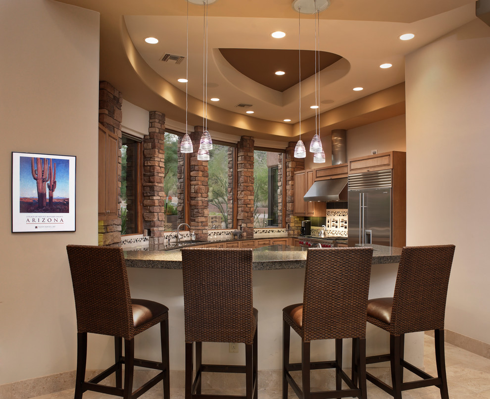 Contemporary kitchen in Phoenix with stainless steel appliances.