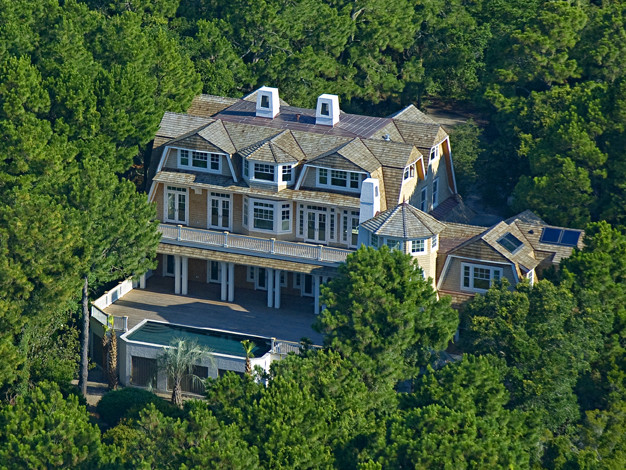 Ornate exterior home photo in Charleston