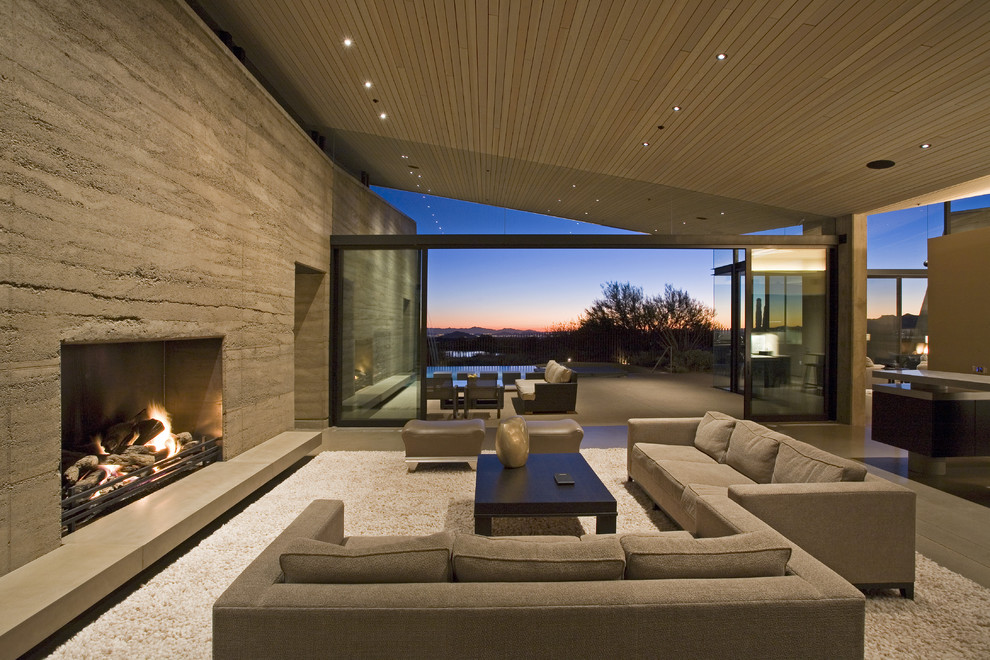 Contemporary open concept living room in Phoenix with a standard fireplace and no tv.