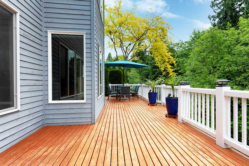 Inspiration for a backyard wood railing deck remodel in Boston
