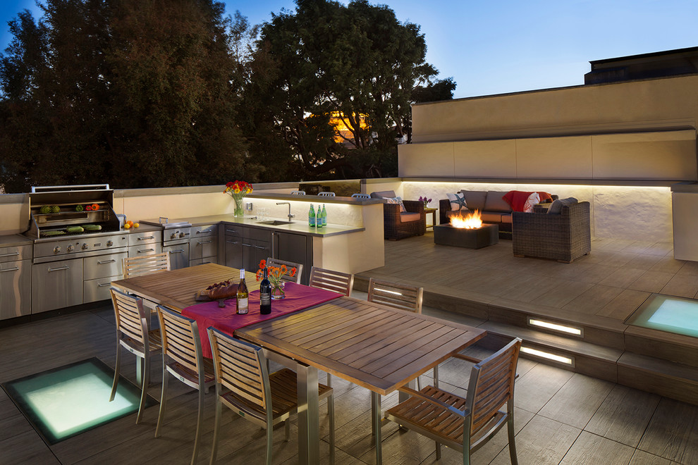 Inspiration for a large contemporary rooftop deck in San Francisco with an outdoor kitchen and no cover.