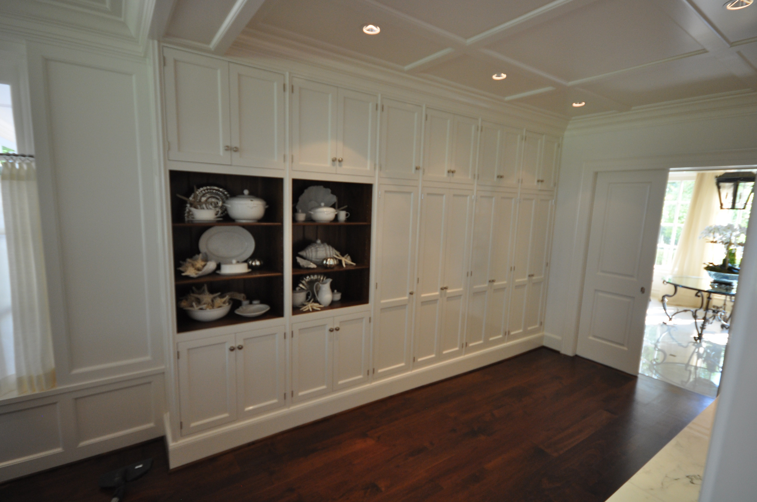 Signature Kitchen with custom made hardware, hand painted with high gloss paint.