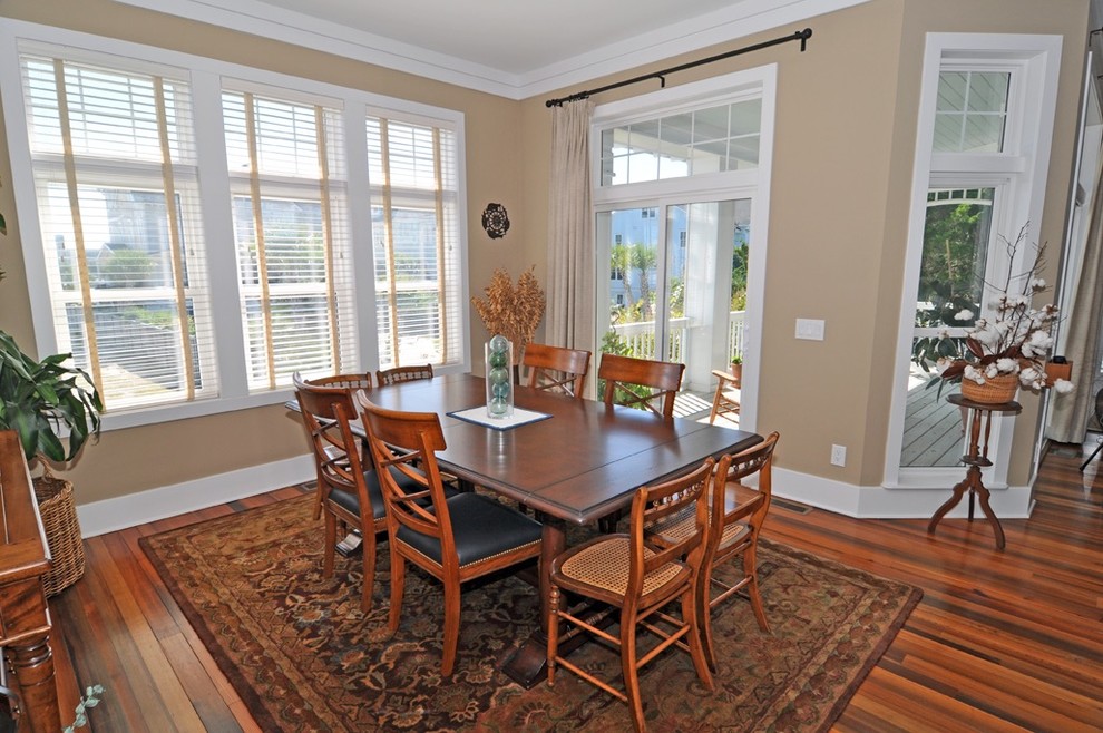 Design ideas for a mid-sized traditional open plan dining in Wilmington with beige walls and medium hardwood floors.