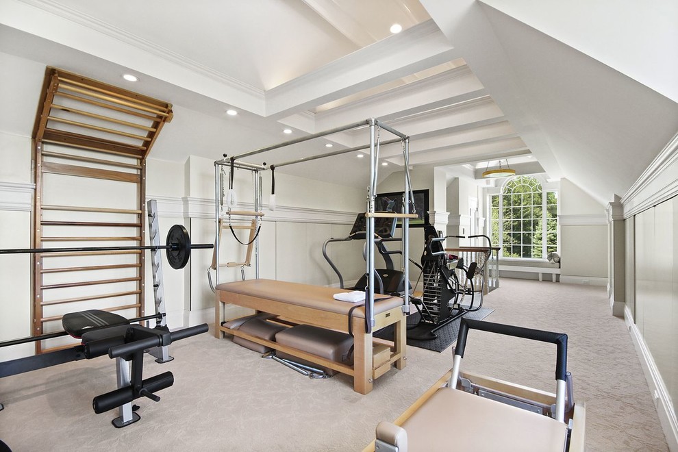 Large traditional home weight room in New York with carpet.
