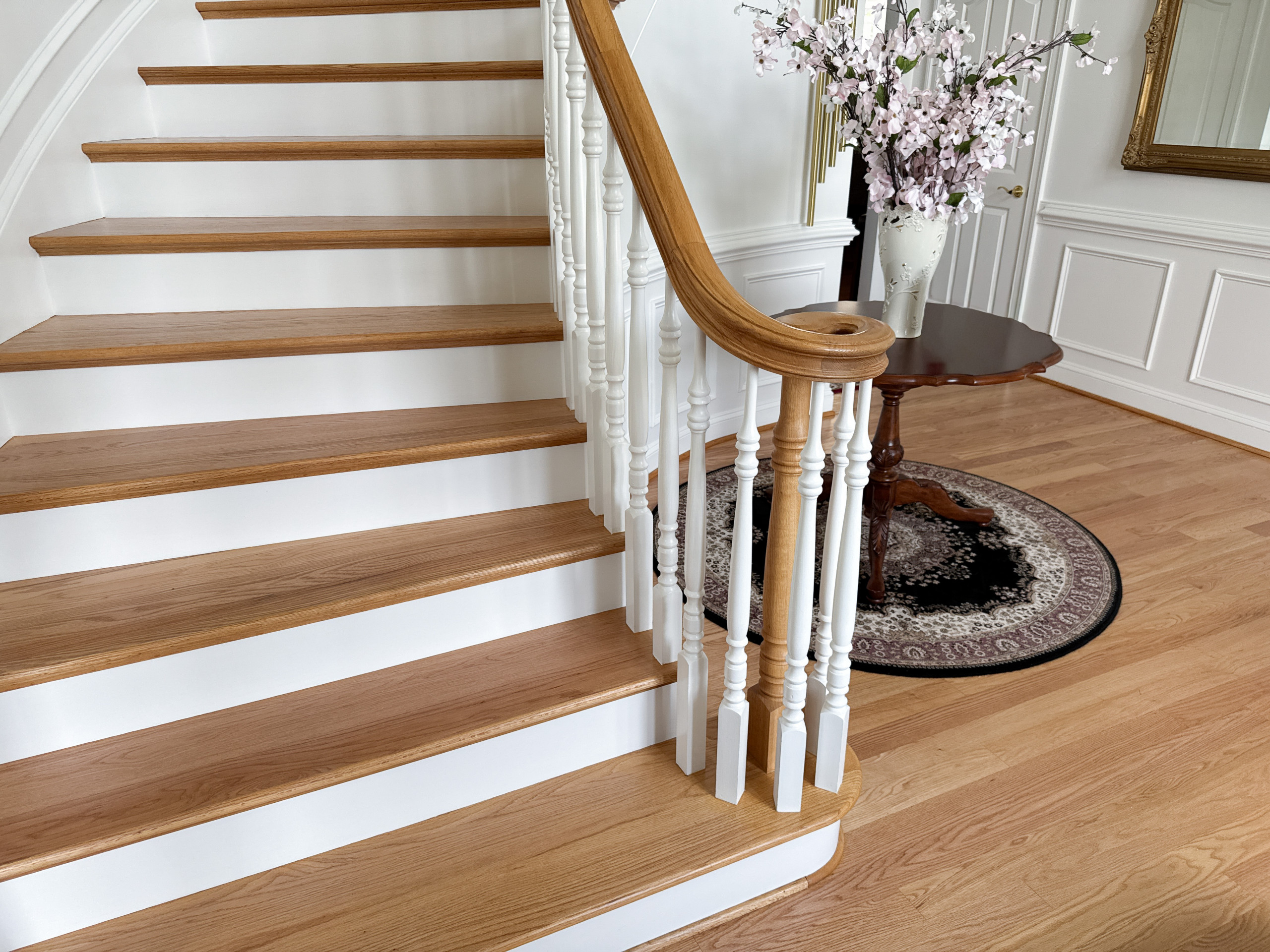 Project #161 | Curved Red Oak Foyer Staircase, 26 Years Later