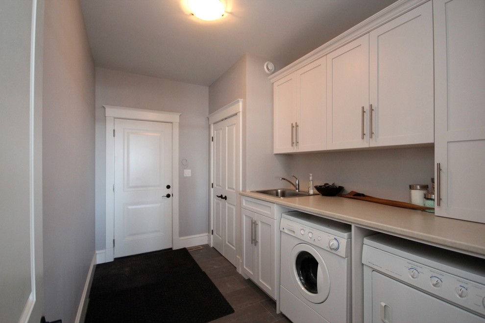 This is an example of an arts and crafts laundry room in Toronto.