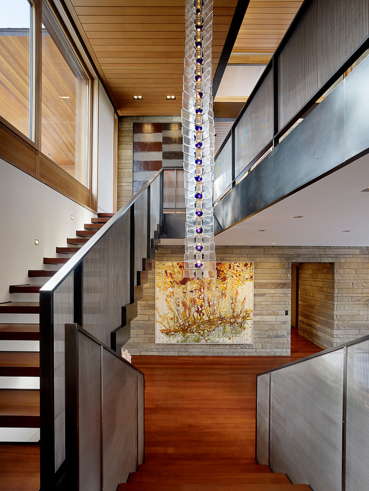 This is an example of a contemporary u-shaped staircase in Other.