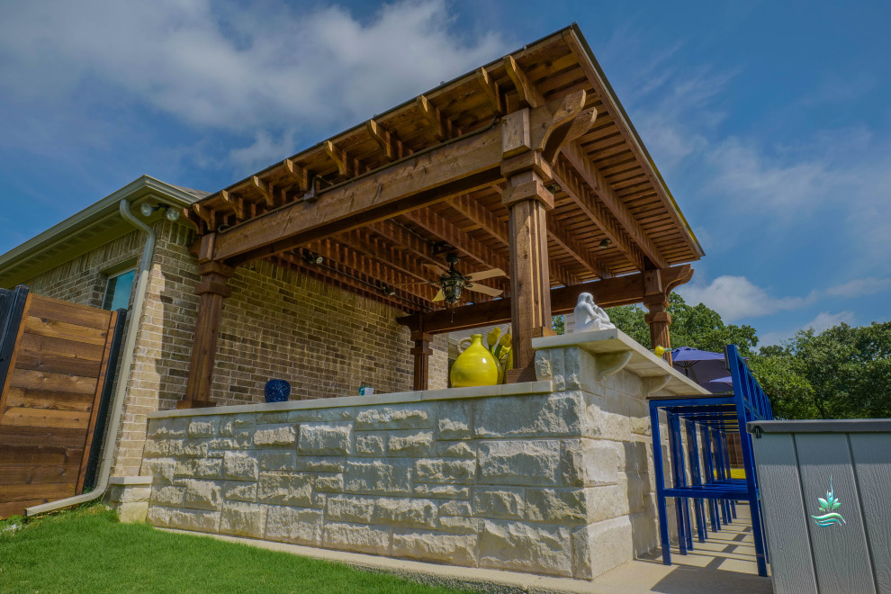 Huge tuscan backyard custom-shaped infinity pool landscaping photo in Dallas with decking