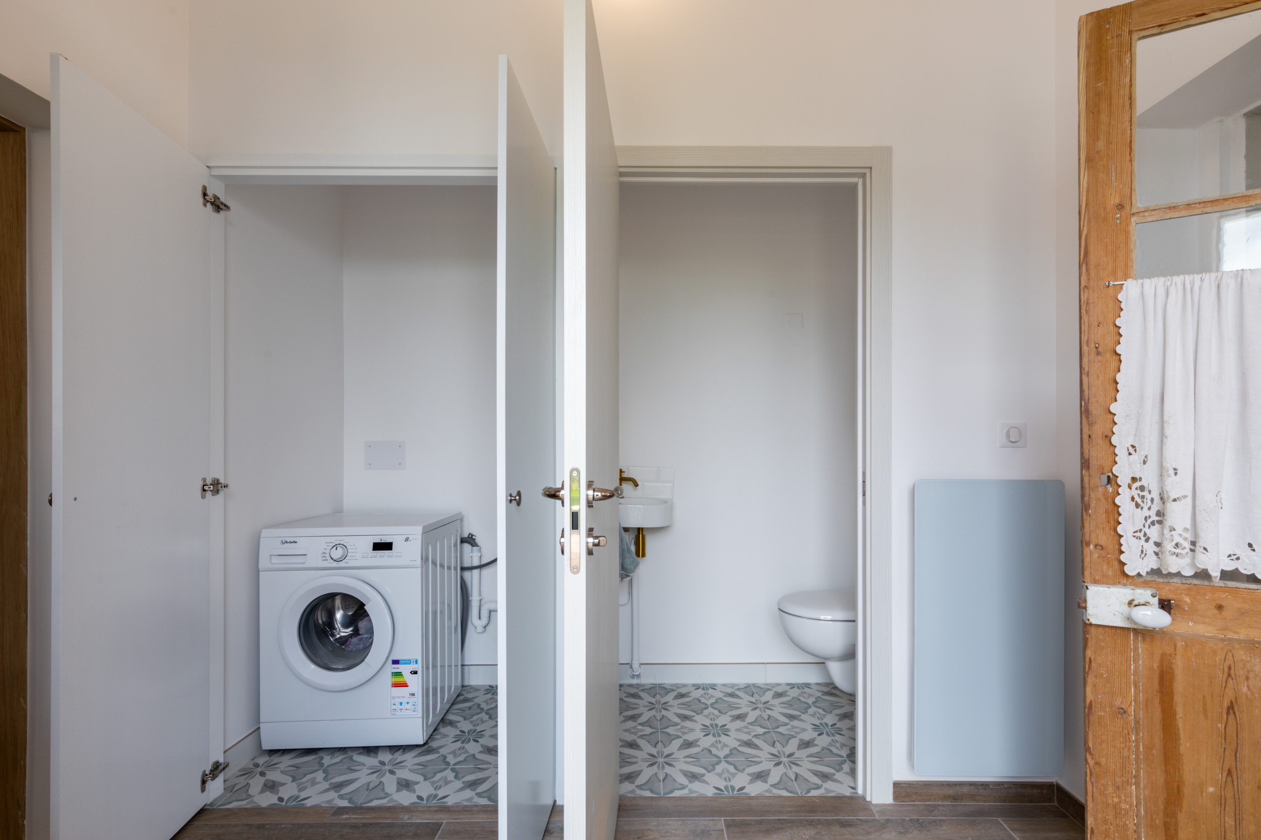 Transformation d'une chambre parentale en pièce de vie/cuisine
