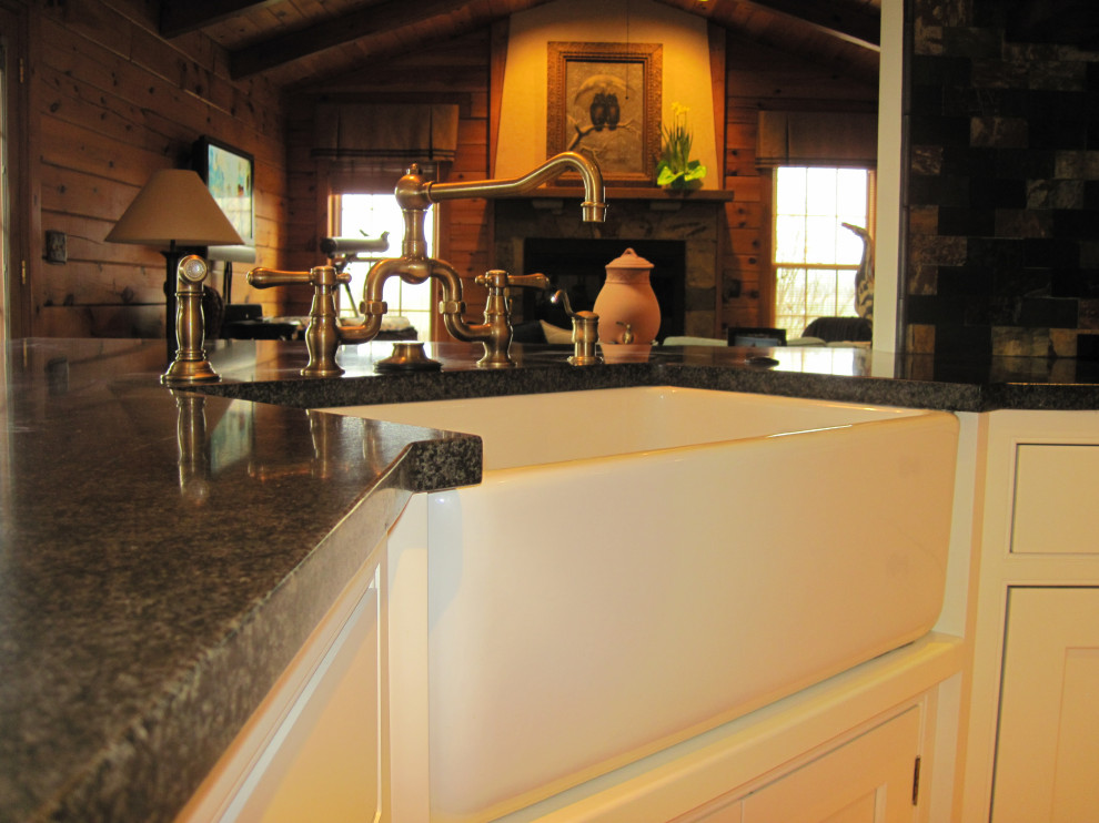 Eat-in kitchen - mid-sized transitional u-shaped light wood floor and shiplap ceiling eat-in kitchen idea in DC Metro with a farmhouse sink, shaker cabinets, white cabinets, quartz countertops, multicolored backsplash, stone tile backsplash, stainless steel appliances, a peninsula and black countertops