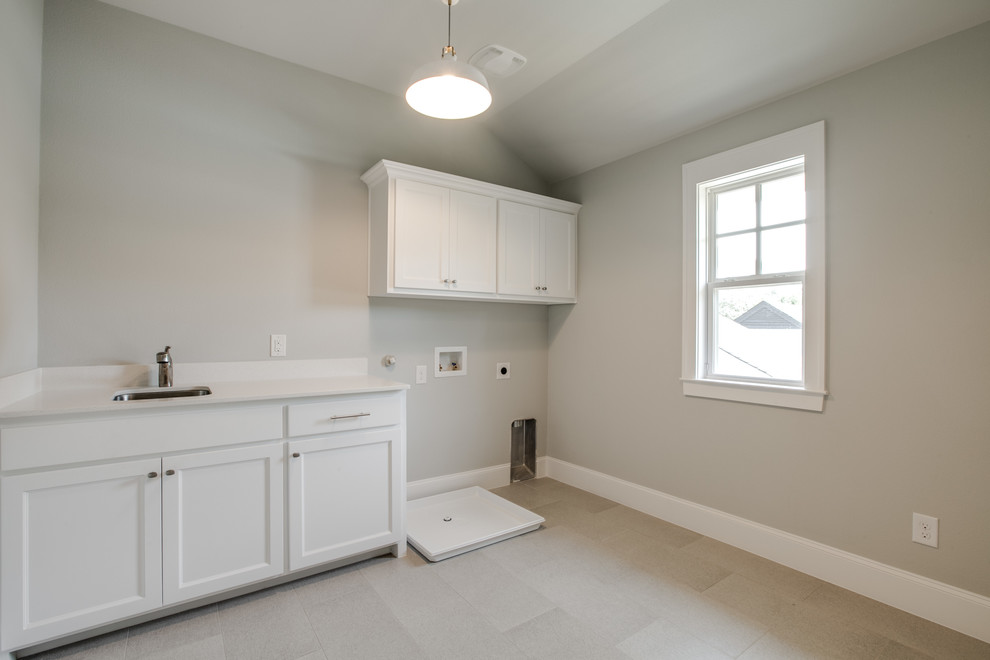 Transitional laundry room photo in Dallas