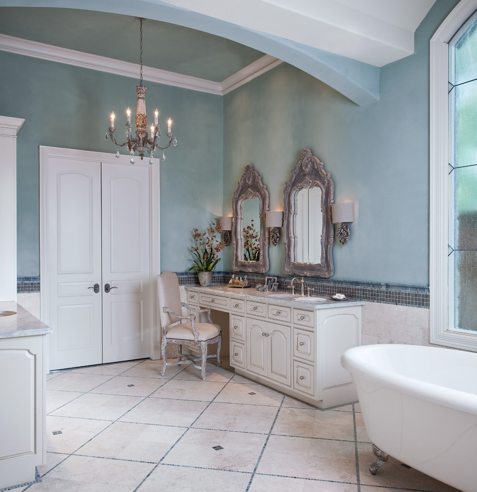 Photo of a traditional bathroom in Dallas with a claw-foot tub.