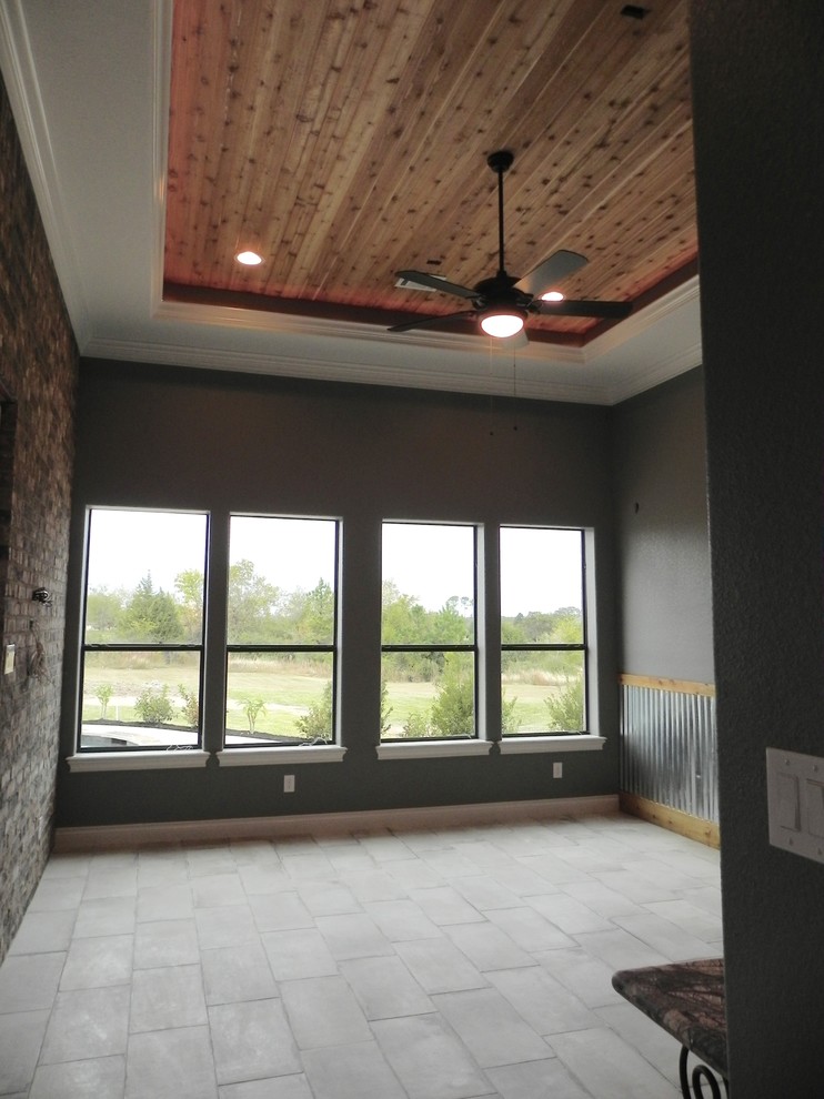 Mid-sized industrial enclosed family room in Houston with a game room, grey walls and ceramic floors.