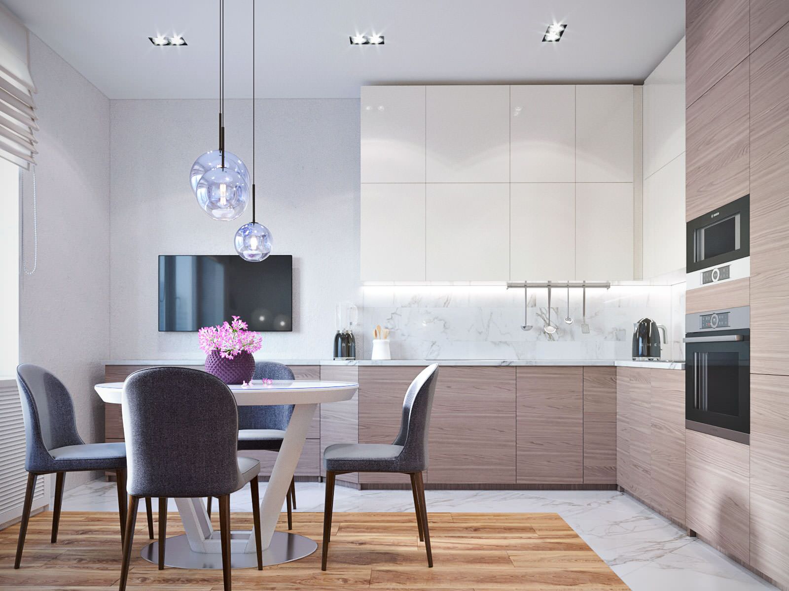 Единая зона кухни, столовой и гостиной.