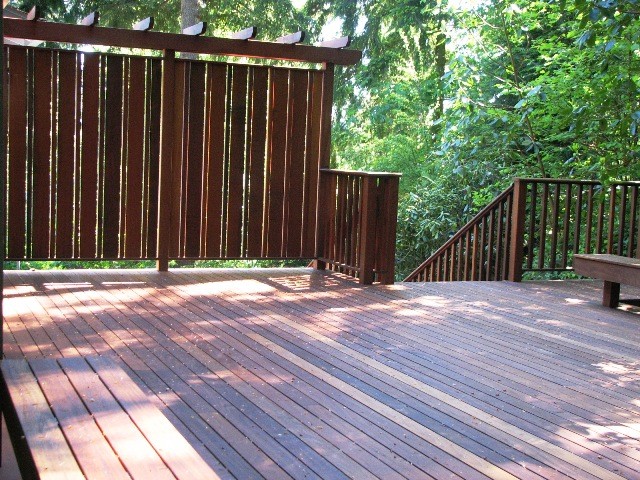 Inspiration for an arts and crafts backyard deck in Seattle with a pergola.