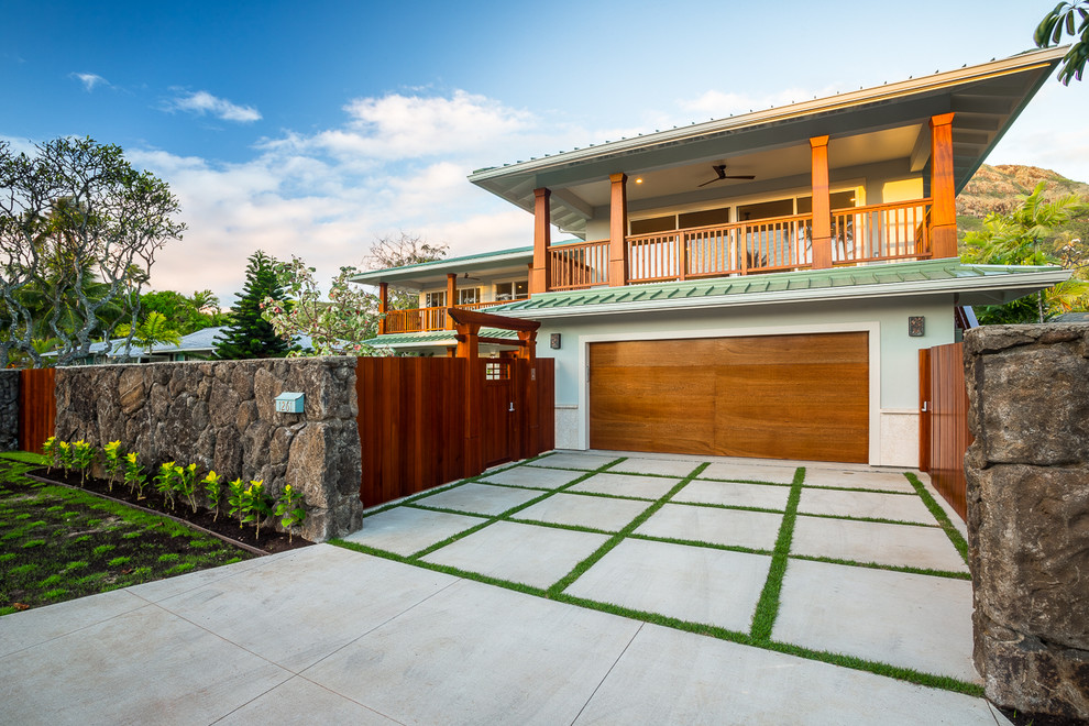 Design ideas for a large tropical attached two-car garage in Hawaii.