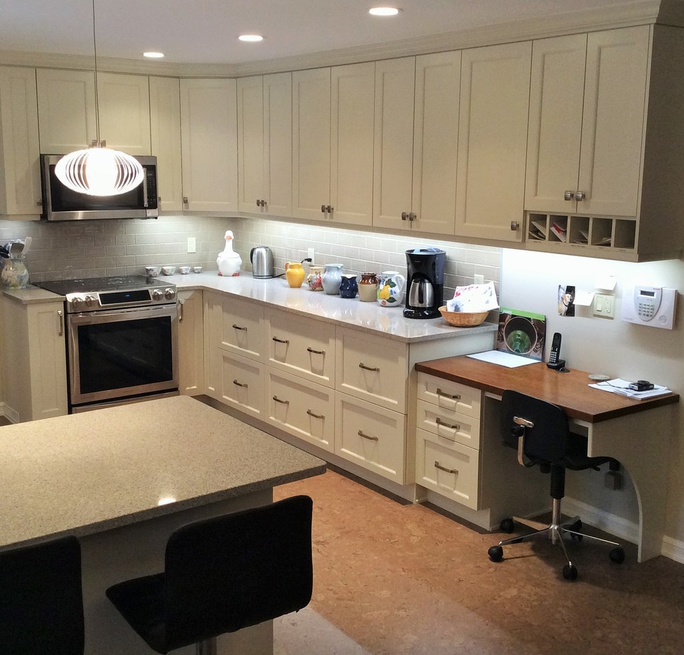 Transitional cork floor kitchen photo in Edmonton with white cabinets, quartzite countertops, gray backsplash, ceramic backsplash and stainless steel appliances