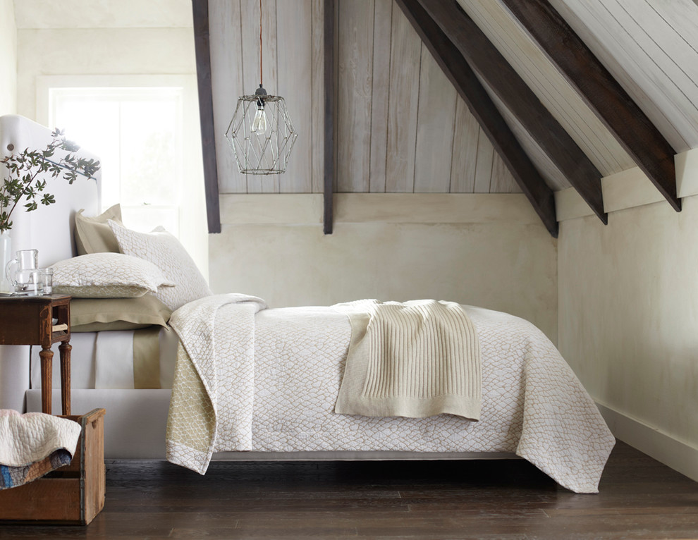 Inspiration for a mid-sized rustic loft-style dark wood floor bedroom remodel with gray walls