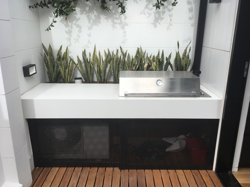 Design ideas for a small contemporary backyard deck in Sydney with an outdoor kitchen and no cover.