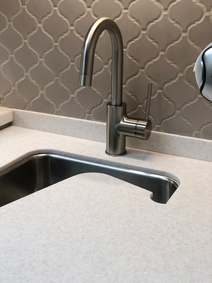 Inspiration for a small transitional laundry room remodel in Cincinnati