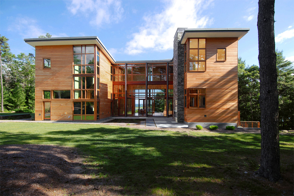Modern exterior in Providence with wood siding.
