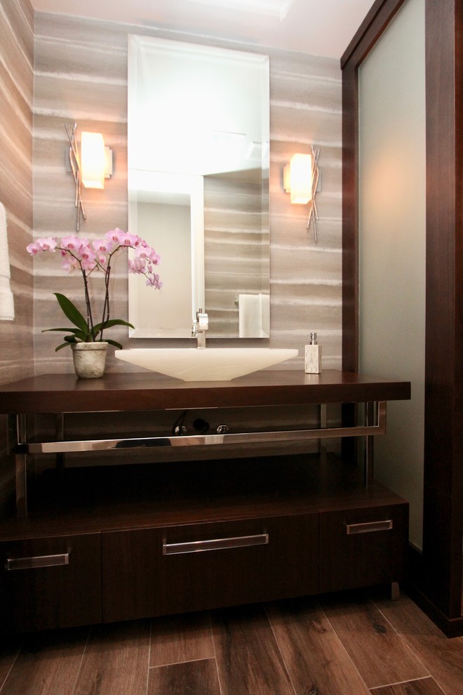 This is an example of a transitional powder room in San Diego.