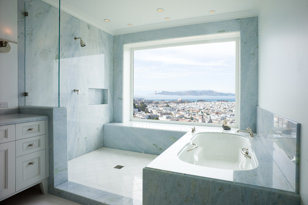 Photo of a mid-sized transitional master bathroom in San Francisco with white walls, an undermount tub, an open shower, a wall-mount sink, white floor, an open shower, recessed-panel cabinets, white cabinets and marble benchtops.