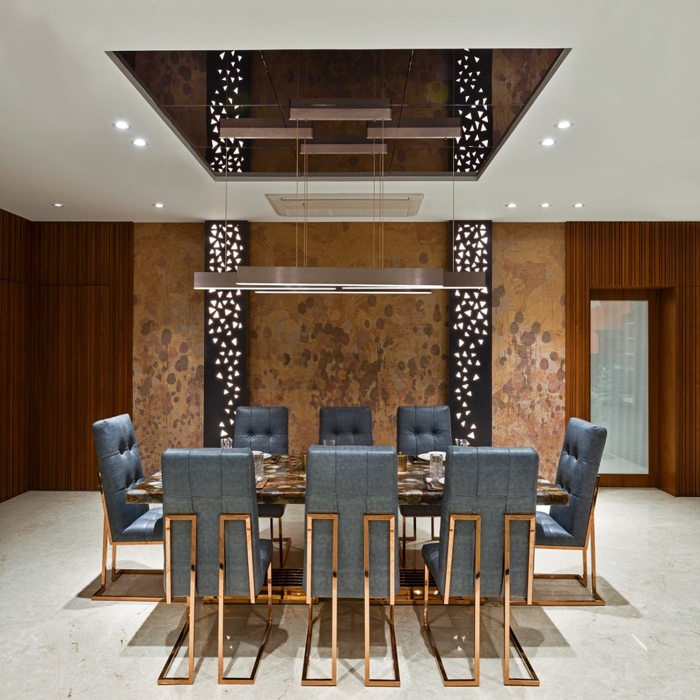 Design ideas for an eclectic dining room in Mumbai.