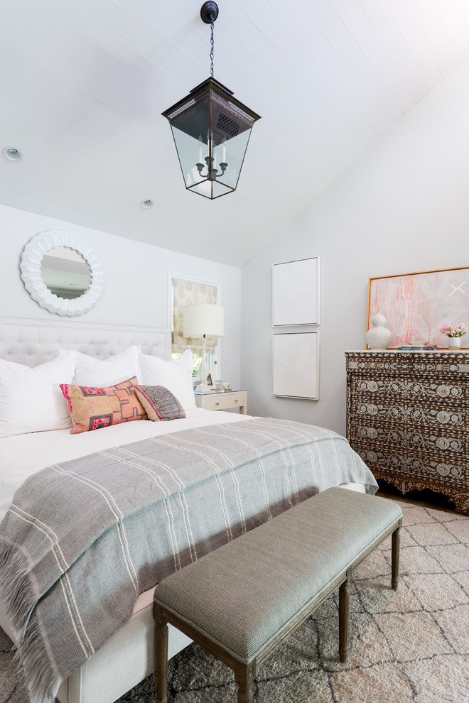 Inspiration for a transitional bedroom in Los Angeles with white walls.