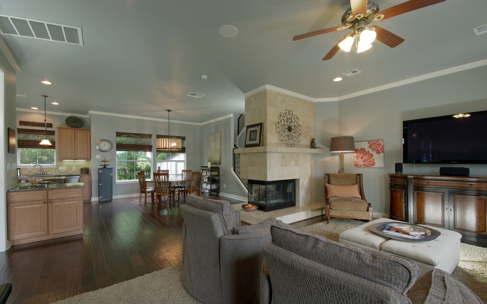 This is an example of a traditional family room in Austin.