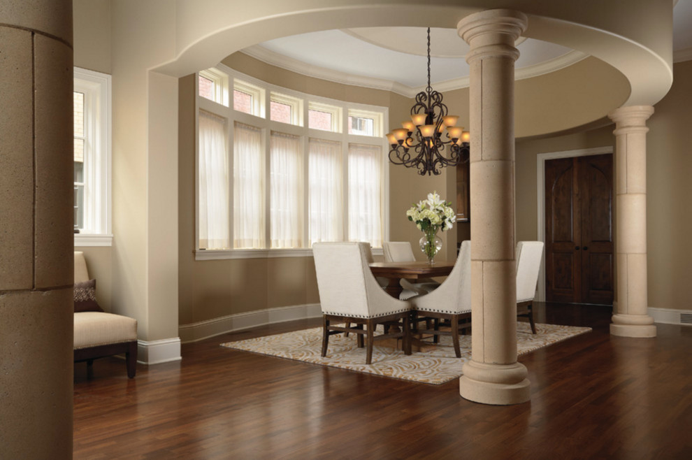 Mid-sized traditional separate dining room in Jackson with beige walls, dark hardwood floors, no fireplace and brown floor.