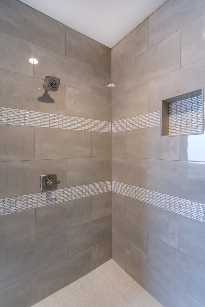Inspiration for a large transitional master bathroom in Seattle with shaker cabinets, dark wood cabinets, a drop-in tub, a corner shower, a two-piece toilet, gray tile, glass tile, grey walls, porcelain floors, an undermount sink, engineered quartz benchtops, grey floor, an open shower and white benchtops.