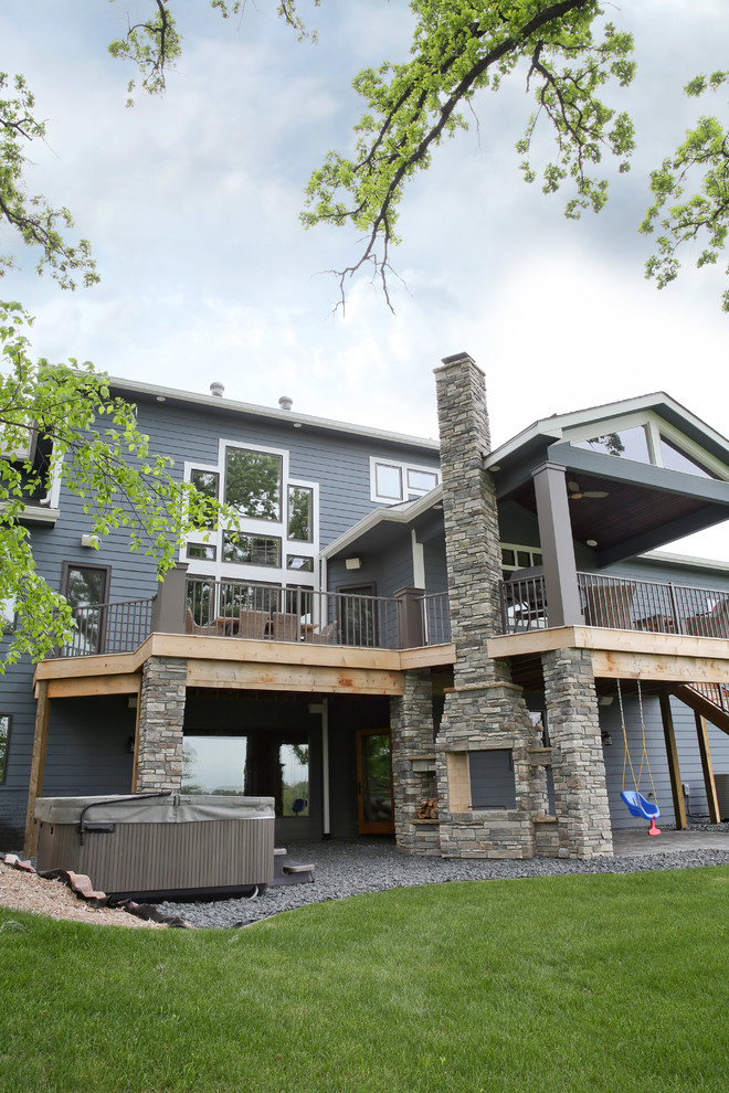 Home design - transitional two-story blue home design idea