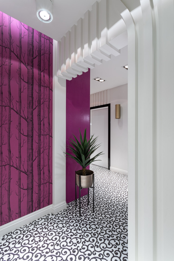 This is an example of a mid-sized contemporary hallway in Other with white walls, porcelain floors, white floor, recessed and panelled walls.