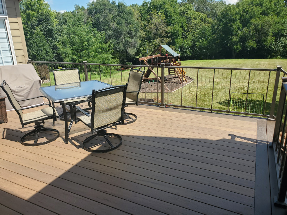 Deck - mid-sized backyard second story cable railing deck idea with no cover
