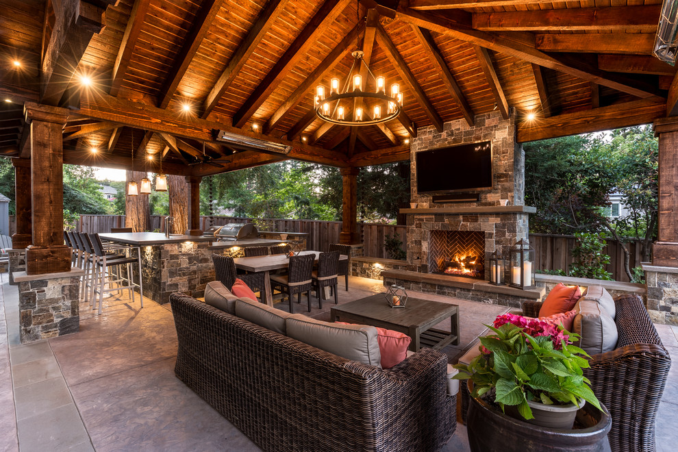 Design ideas for a rustic back patio in San Francisco with an outdoor kitchen and a pergola.