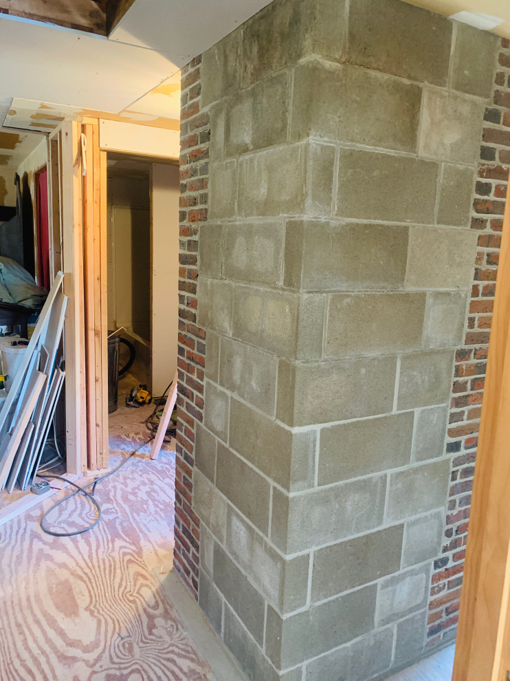 Home Renovation Fully exposed brick chimney finished in cinder blocks
