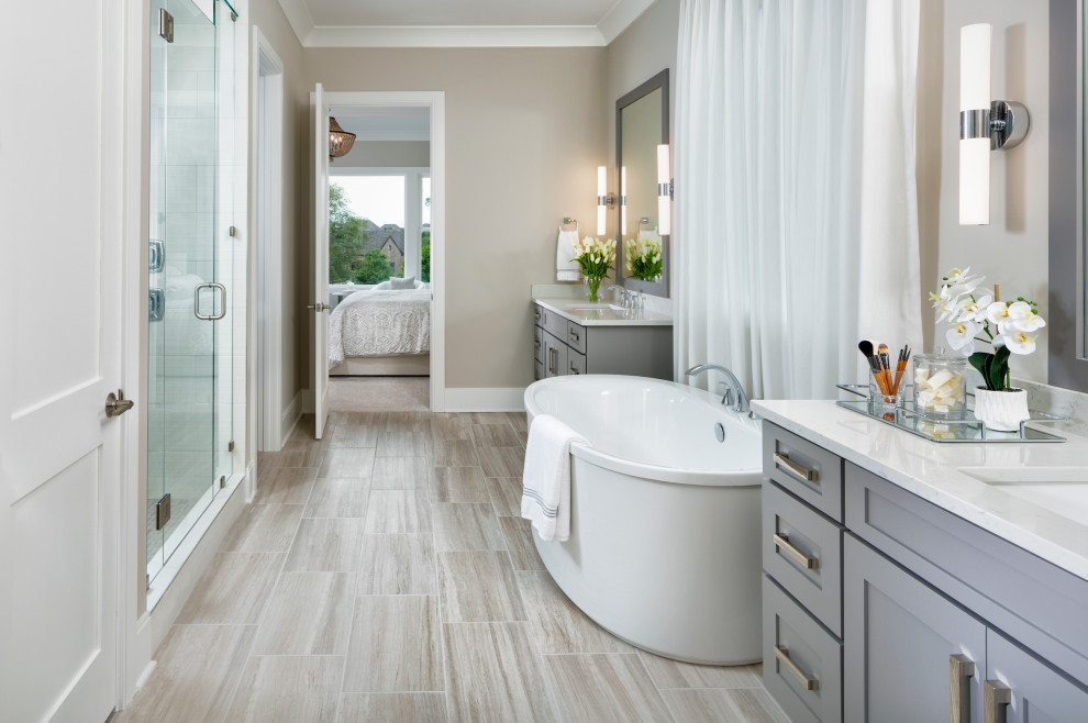 Huge trendy master ceramic tile and double-sink bathroom photo in Nashville with shaker cabinets, gray cabinets, gray walls, an undermount sink, a hinged shower door, a niche and a built-in vanity