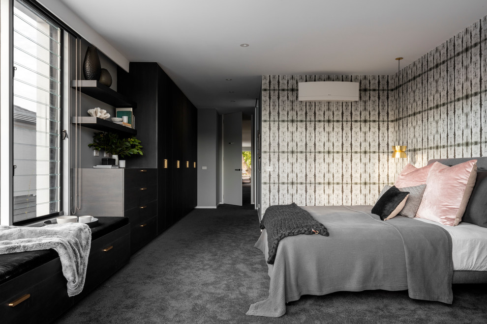 Design ideas for a large contemporary master bedroom in Sydney with grey walls and carpet.
