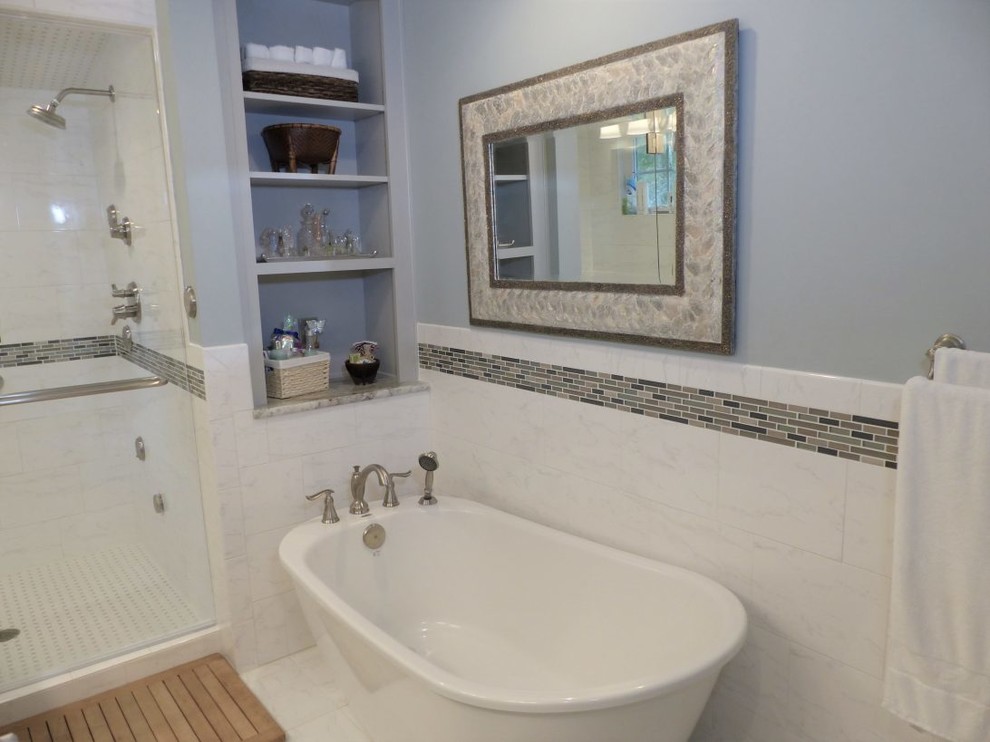 Inspiration for a mid-sized modern master bathroom in Los Angeles with open cabinets, purple cabinets, a freestanding tub, an alcove shower, white tile, ceramic tile, purple walls, porcelain floors, marble benchtops, white floor, a hinged shower door and grey benchtops.