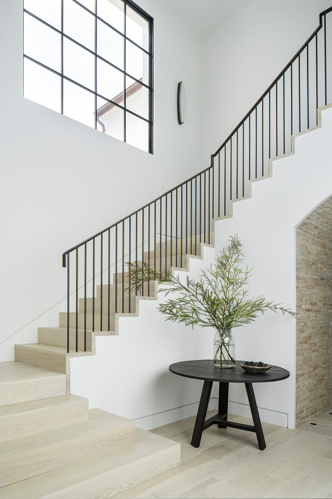 Design ideas for a transitional staircase in Orange County.