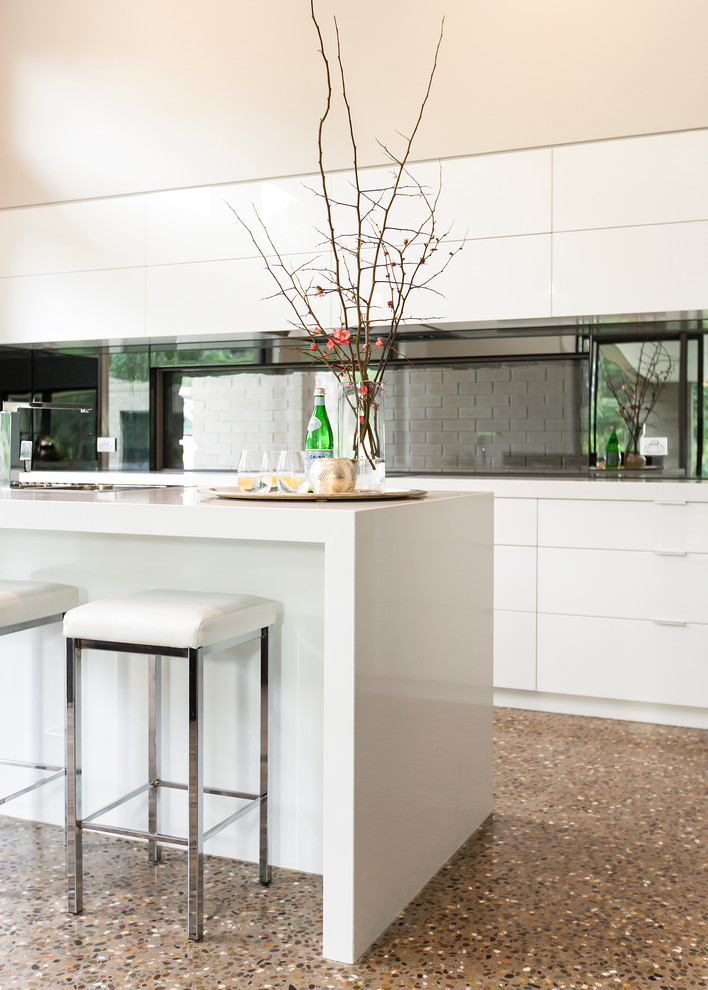 Photo of a contemporary kitchen in Toronto with concrete floors.