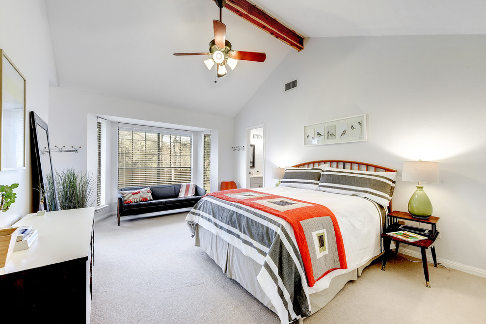 Inspiration for a transitional guest carpeted and beige floor bedroom remodel in Austin with white walls