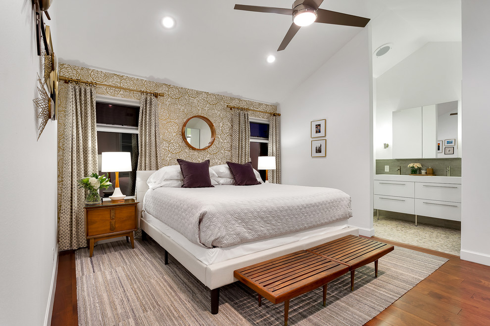 Photo of a mid-sized transitional master bedroom in Phoenix with white walls, medium hardwood floors and no fireplace.